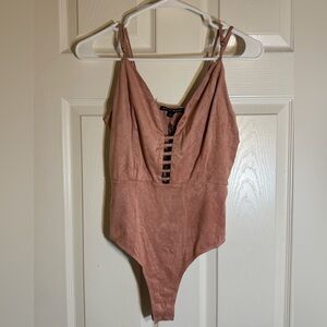 Haute Monde Ladder Cut Out Spaghetti Strap Bodysuit in Pink suede microfiber
